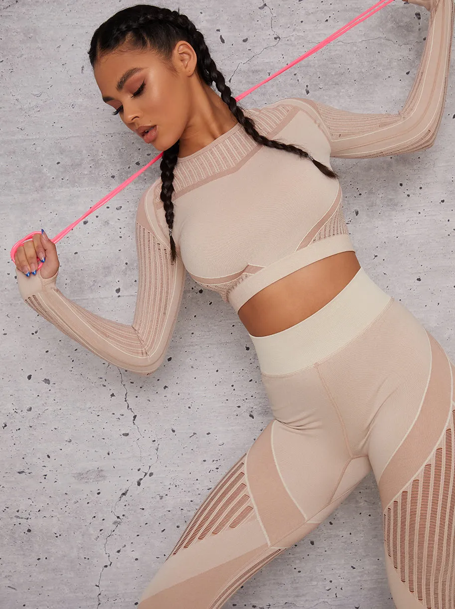 Long Sleeved Cropped Sports Top in Beige sold by Chi Chi London