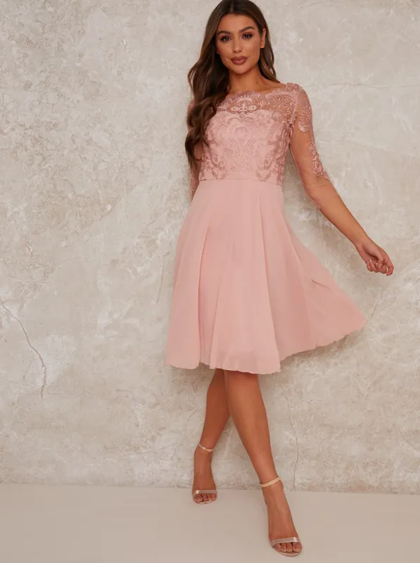 Lace Bridesmaid Midi Dress in Rose Gold sold by Chi Chi London