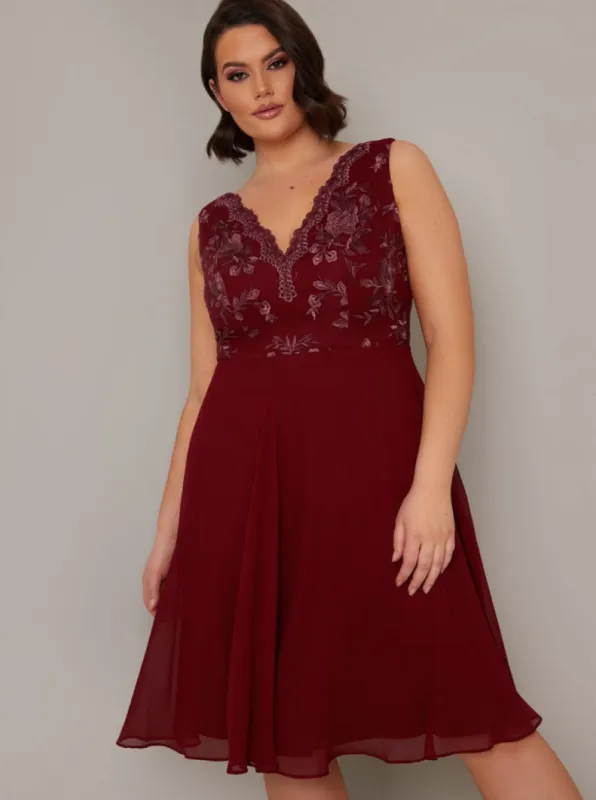 Plus Size Embroidered Bodice Midi Dress in Red sold by Chi Chi London