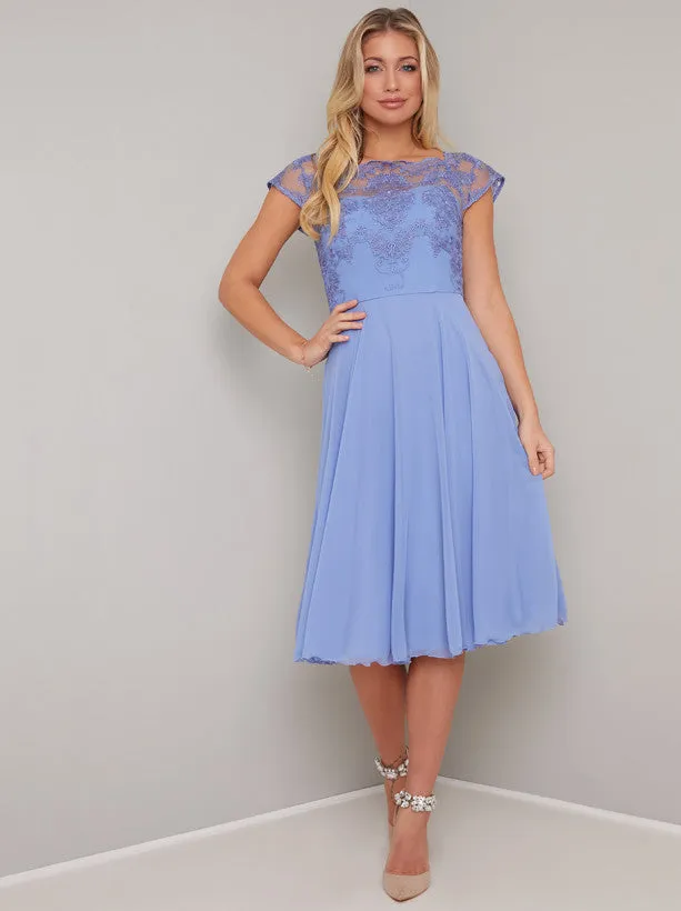 Cap Sleeved Lace Bodice Midi Dress in Blue sold by Chi Chi London