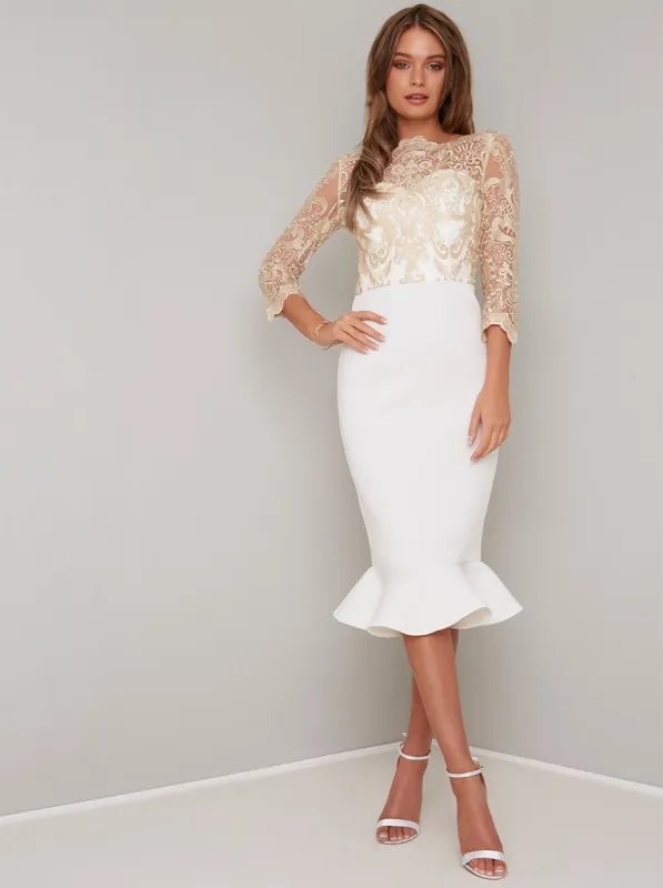 Embroidered Lace Bodycon Peplum Midi Dress in Cream sold by Chi Chi London