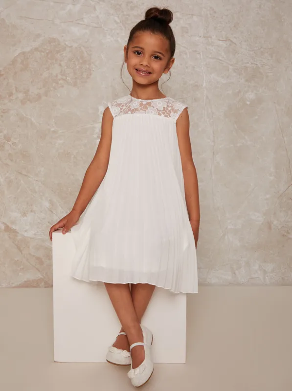 Girls Pleated Crochet Yoke Dress in White sold by Chi Chi London