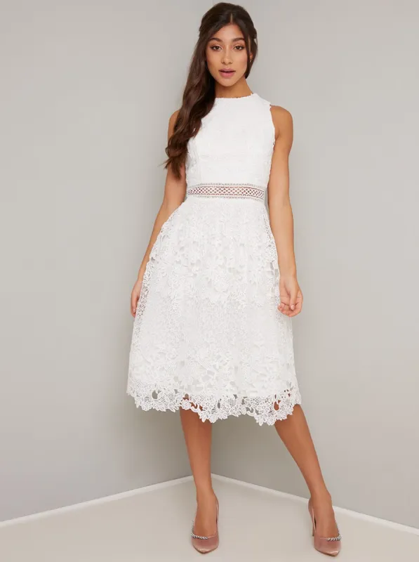 Lace Crochet Midi Dress in White sold by Chi Chi London