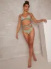 Ruffle Trim Tie Up Bikini Bottoms in Green sold by Chi Chi London