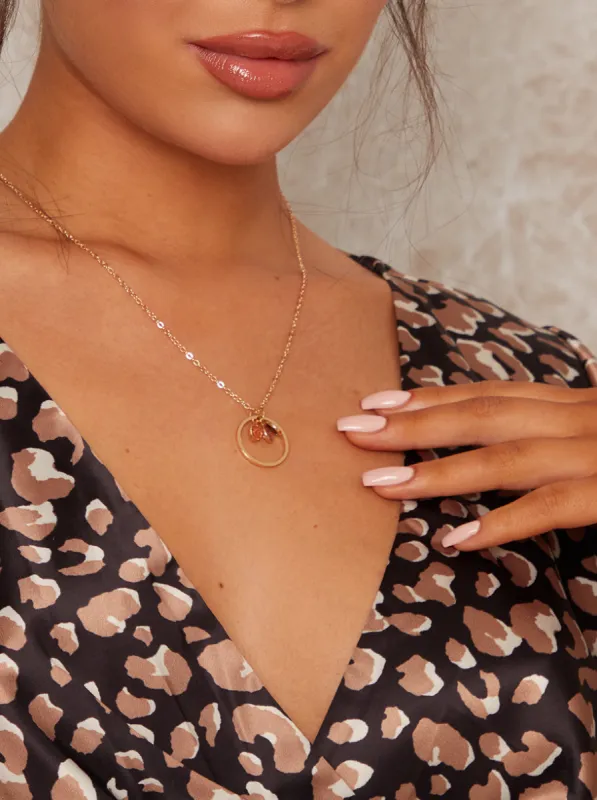 Gold Circle Gem Necklace in Gold Tone sold by Chi Chi London
