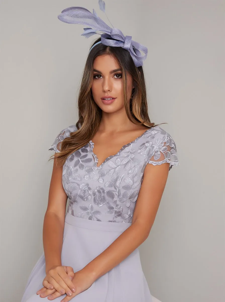 Feather Bow Detail Fascinator in Blue sold by Chi Chi London