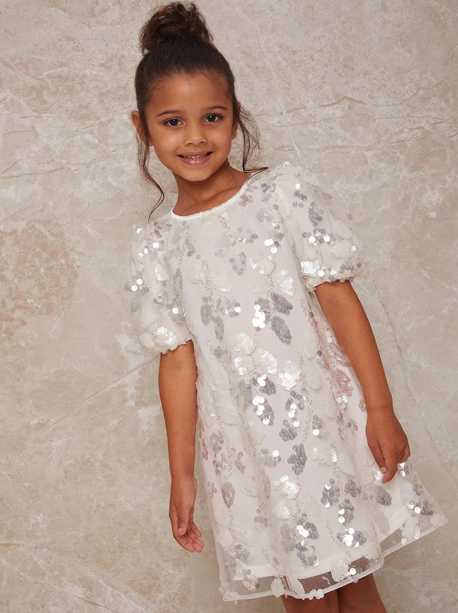Girls Puff Sleeve Sequin Midi Dress in White sold by Chi Chi London