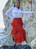 High Waist Pleated Tiered Skirt in Orange sold by Chi Chi London