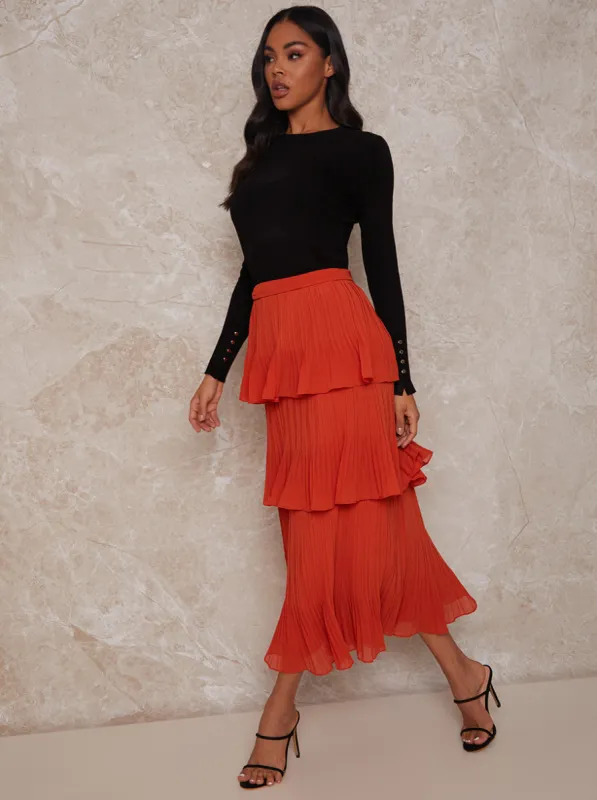 High Waist Pleated Tiered Skirt in Orange sold by Chi Chi London