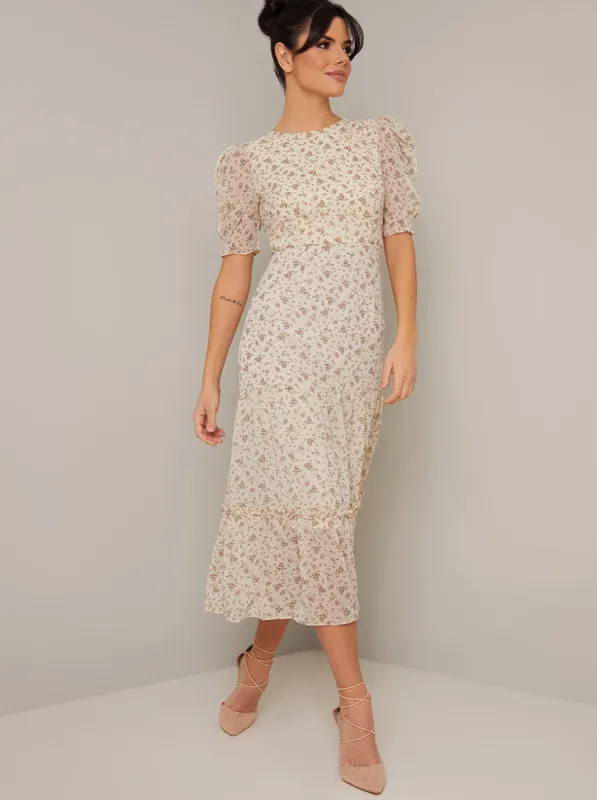 Puff Sleeve Floral Print Midi Dress in Cream sold by Chi Chi London