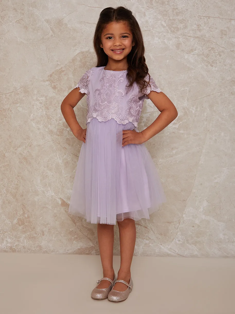 Girls Lace Overlay Dress with Mesh Skirt in Lilac sold by Chi Chi London