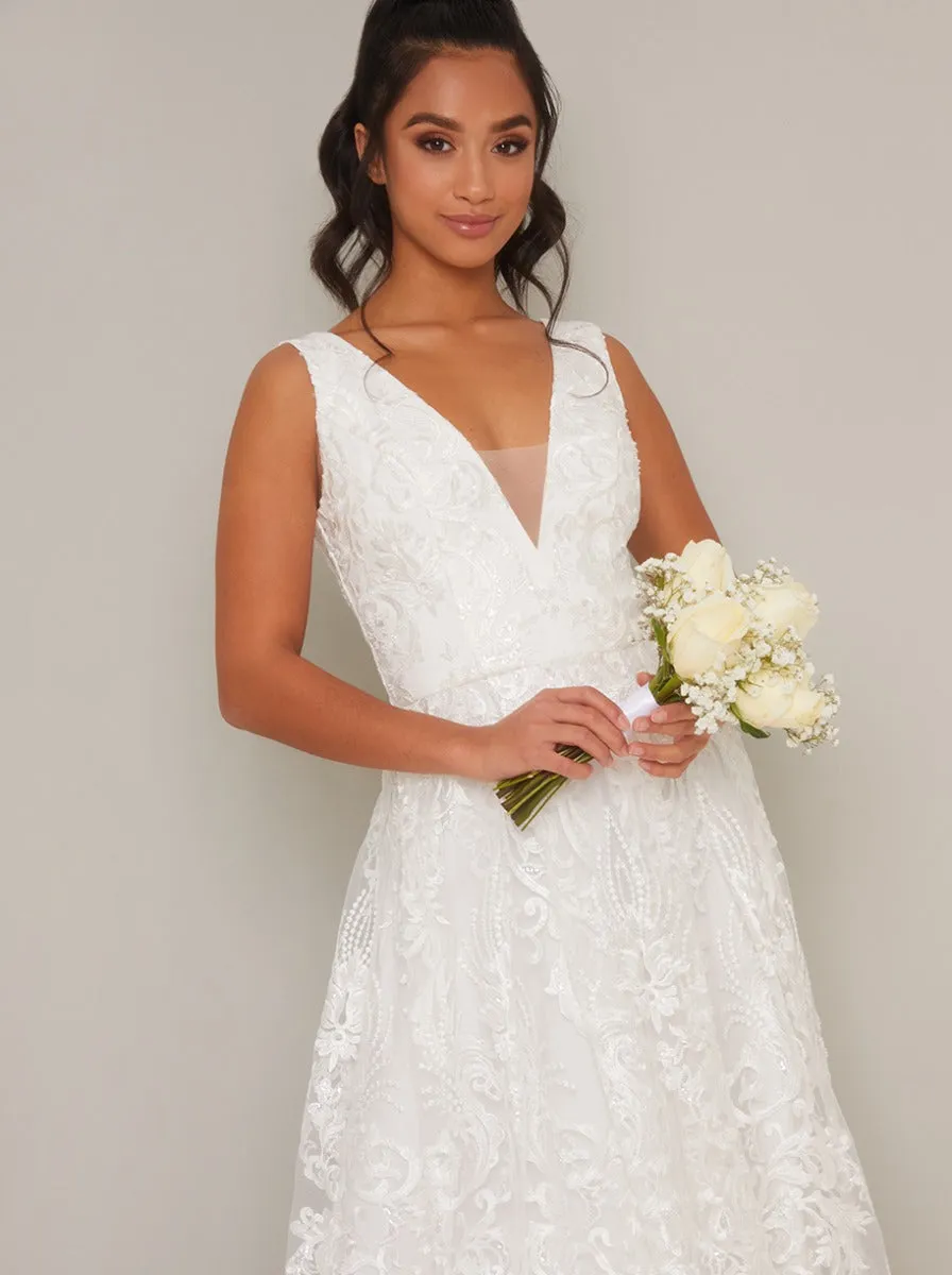 Petite Lace V Neck Maxi Wedding Dress in White sold by Chi Chi London