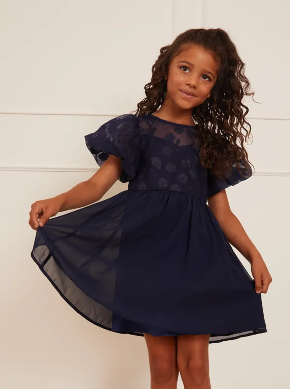 Younger Girls Puff Sleeve Midi Dress in Navy sold by Chi Chi London