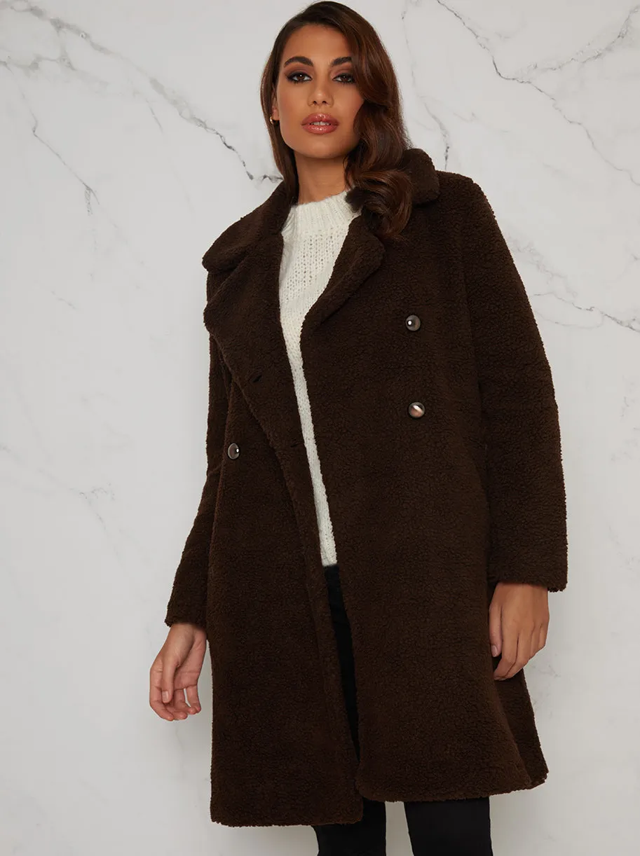 Faux Fur Teddy Double Breasted Coat in Brown sold by Chi Chi London