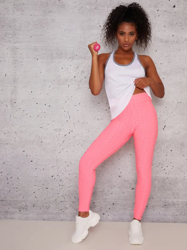 Mid Rise Waffle Effect Sports Leggings in Pink sold by Chi Chi London