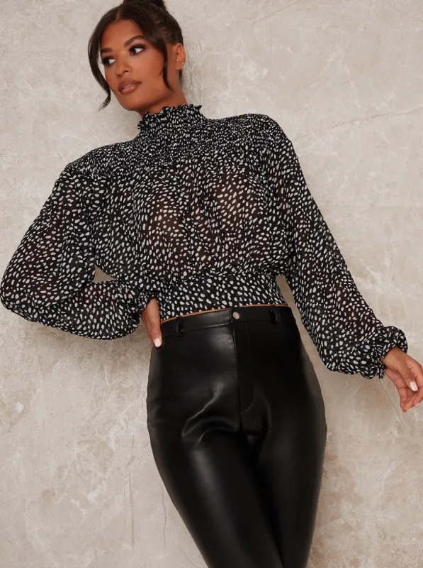 High Neck Balloon Long Sleeve Print Top in Black sold by Chi Chi London