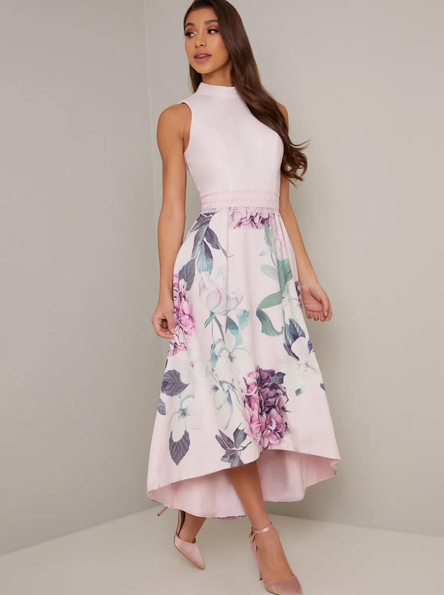 High Neck Dip Hem Floral Midi Dress in Purple sold by Chi Chi London