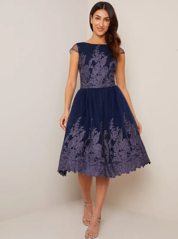 Cap Sleeve Floral Embroidered Skater Dress in Blue sold by Chi Chi London
