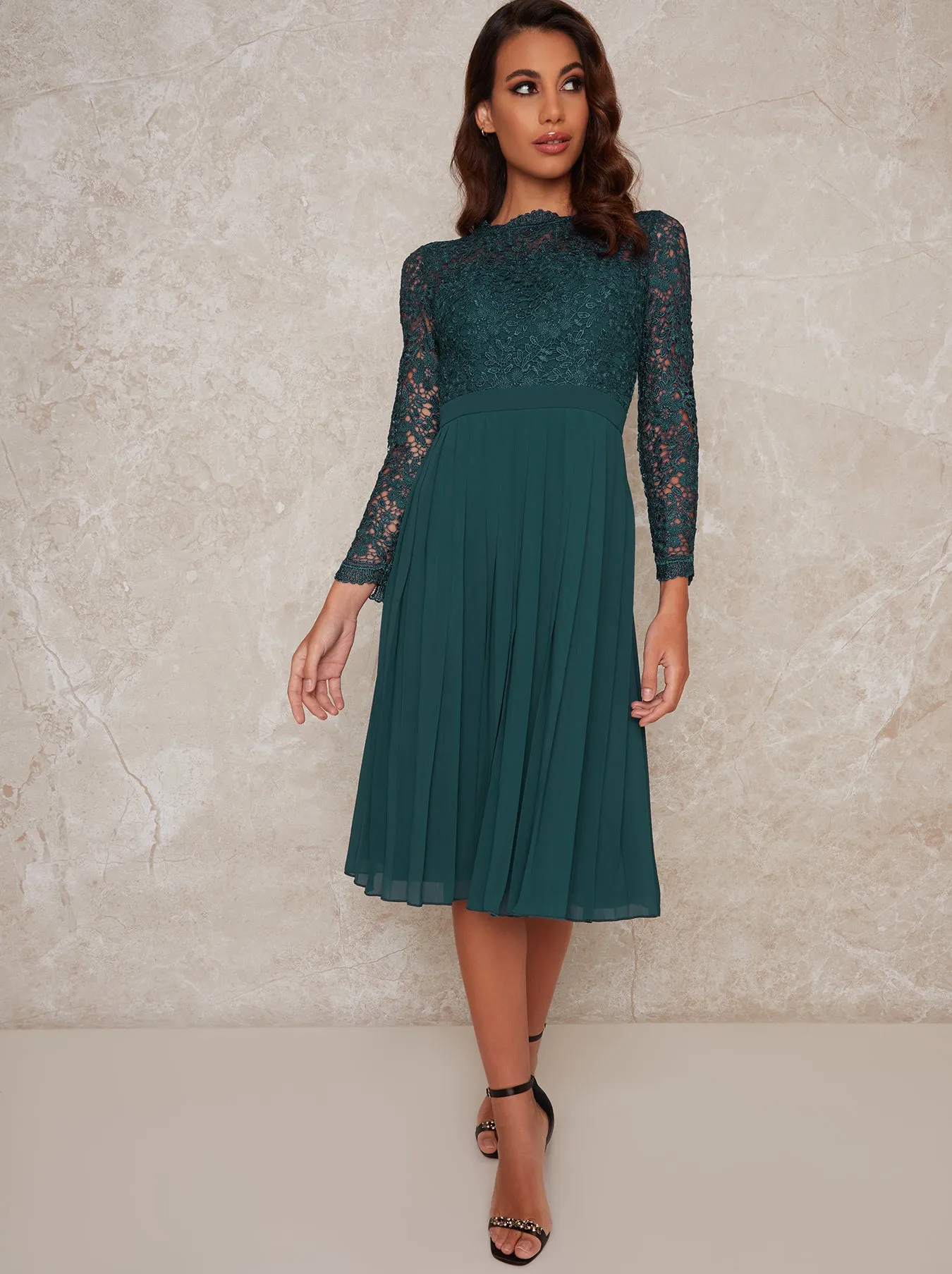 Crochet Bodice Pleated Skater Dress in Green sold by Chi Chi London