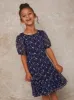 Girls Puff Sleeve Floral Embroidered Midi Dress in Navy sold by Chi Chi London