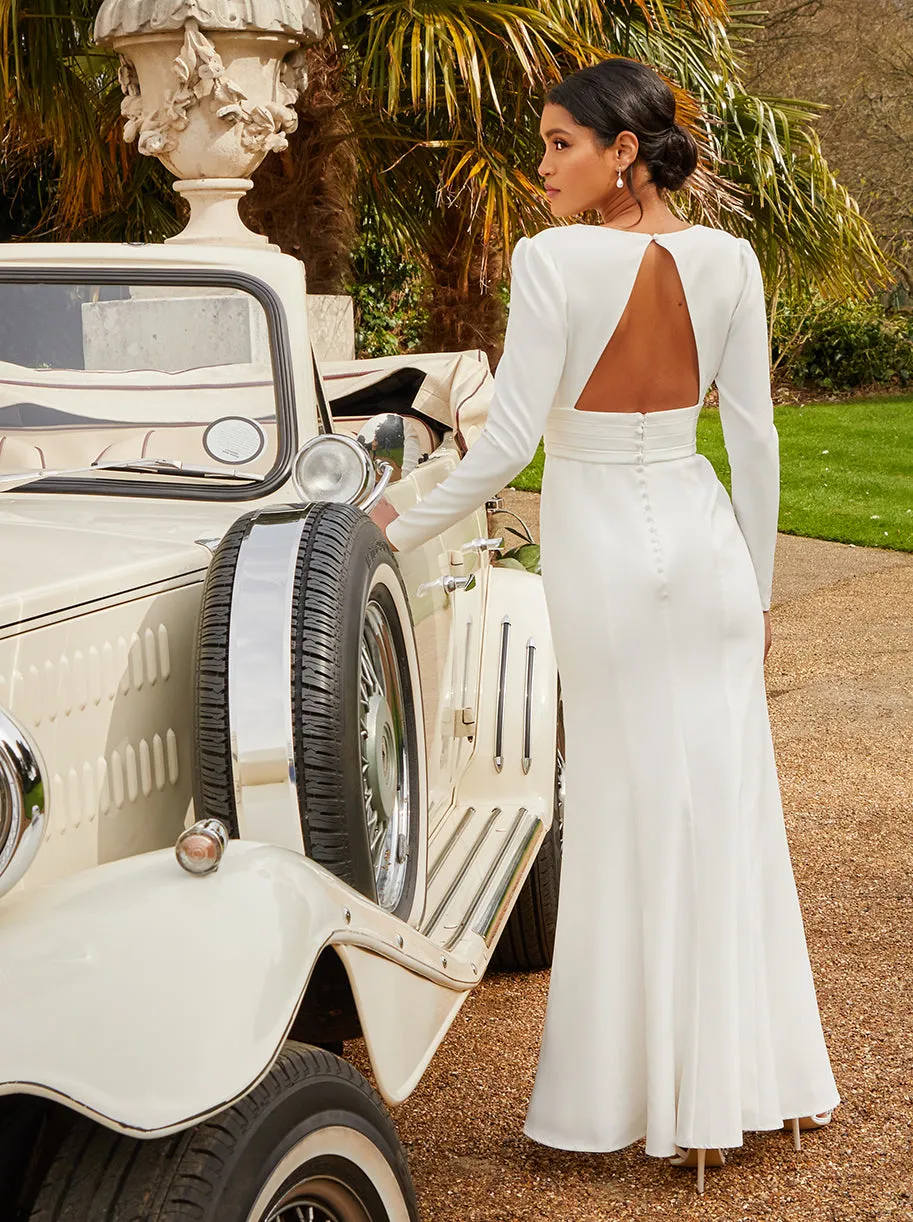 Long Sleeve Plunge Open Back Wedding Dress in White sold by Chi Chi London