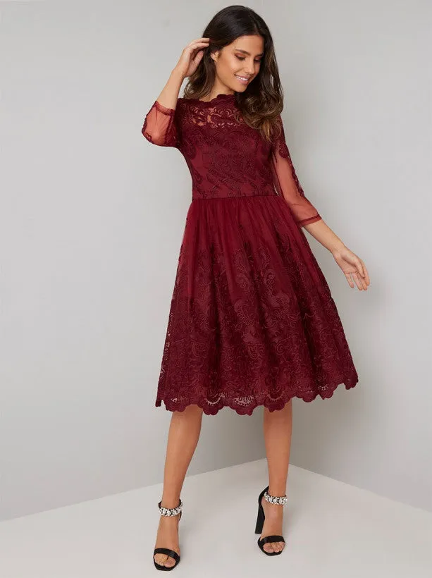 Sheer Sleeved Lace Bodice Midi Dress in Red sold by Chi Chi London