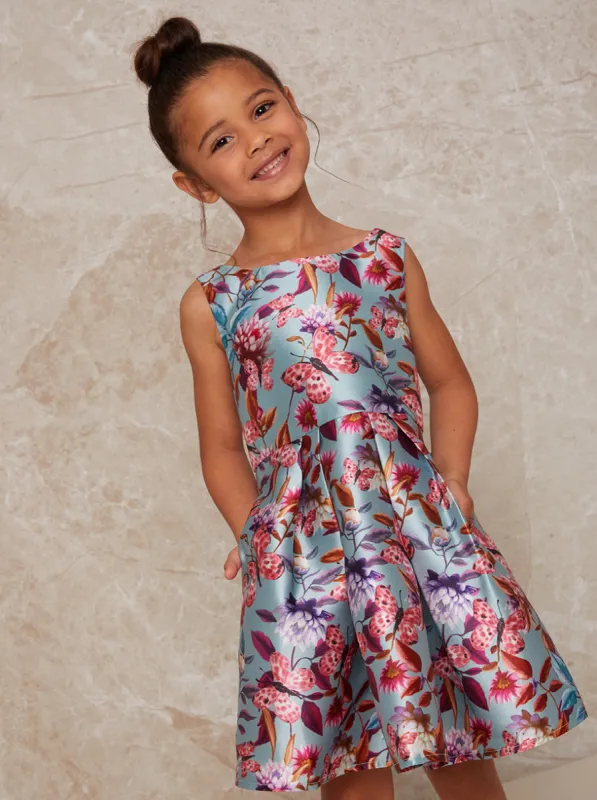Girls Sleeveless Floral Print Pleated Dress in Green sold by Chi Chi London