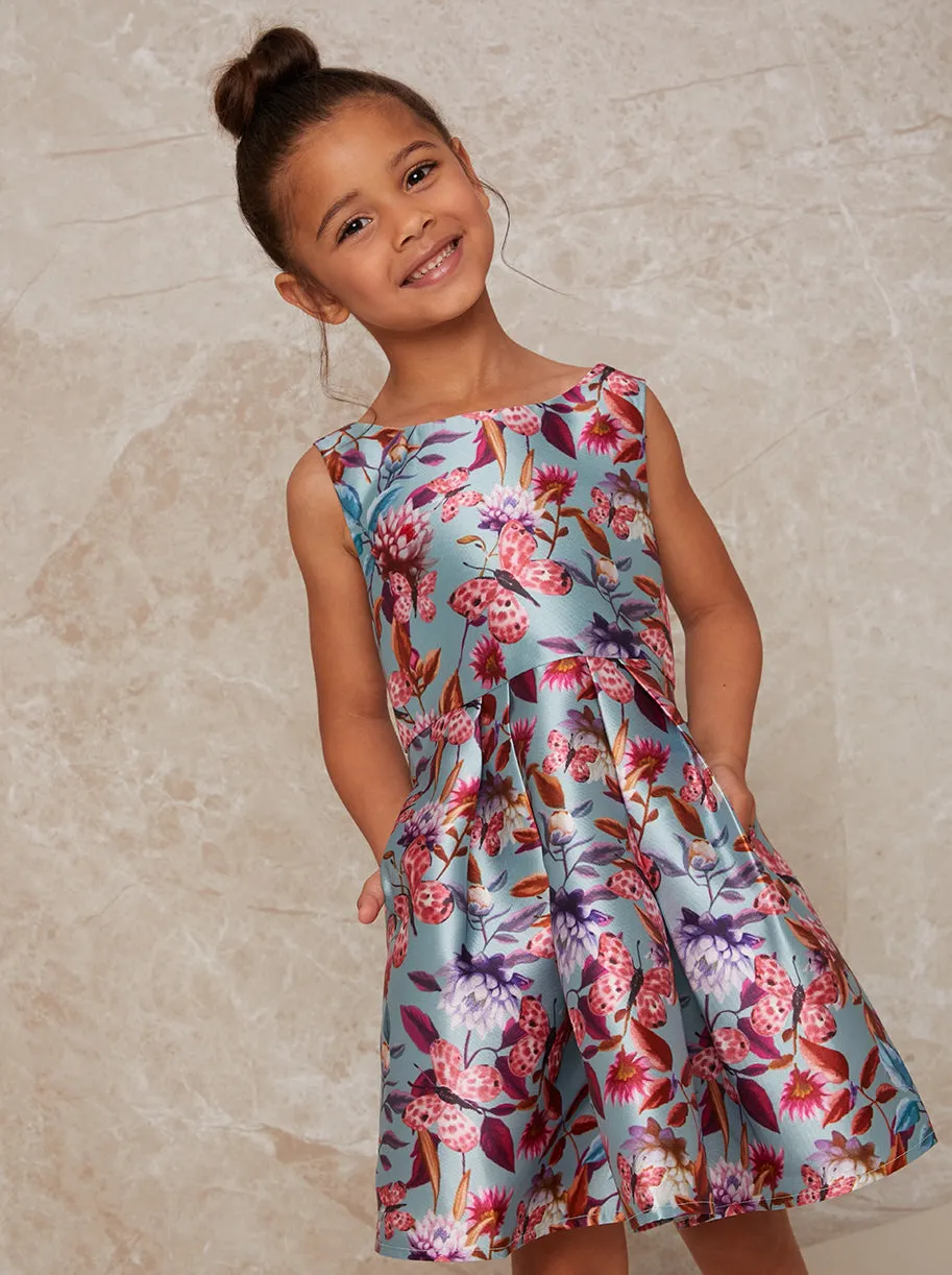 Girls Sleeveless Floral Print Pleated Dress in Green sold by Chi Chi London