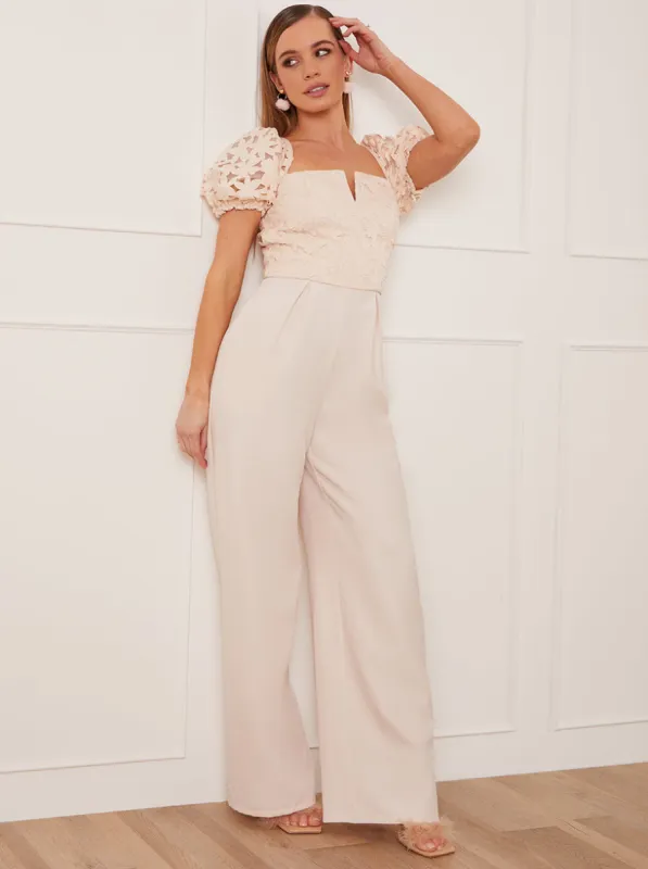 Puff Sleeve Crochet Jumpsuit in Cream sold by Chi Chi London