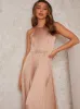High Neck Satin Pleated Maxi Dress in Champagne sold by Chi Chi London
