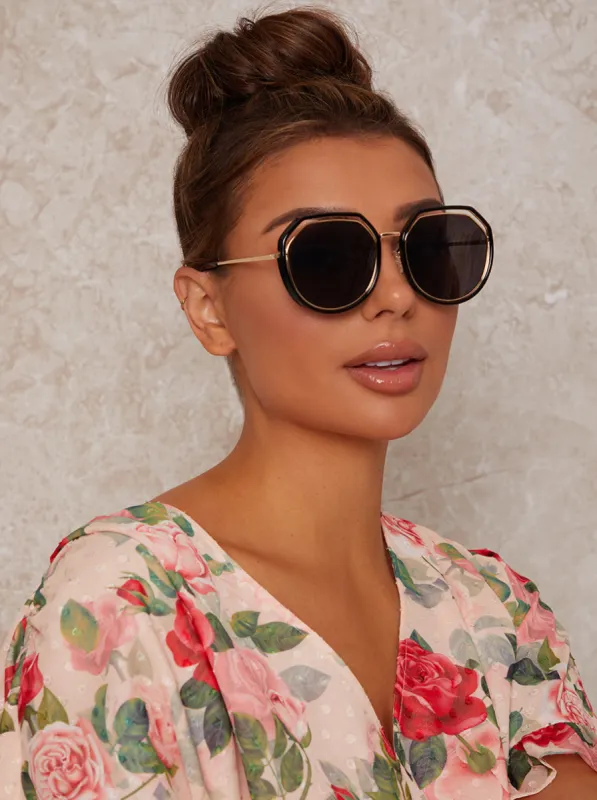 Oversized Sunglasses with Cut-Out Frame in Black sold by Chi Chi London