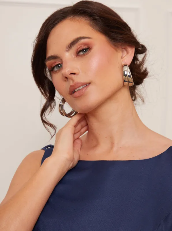 Small Hoop Earrings in Silver Effect sold by Chi Chi London