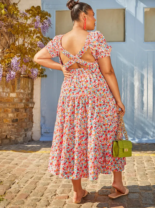 Plus Size Cross Back Puff Sleeve Floral Midi Dress in Red sold by Chi Chi London