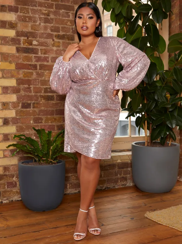 Plus Size Long Sleeve Plunge Sequin Midi Dress in Pink sold by Chi Chi London