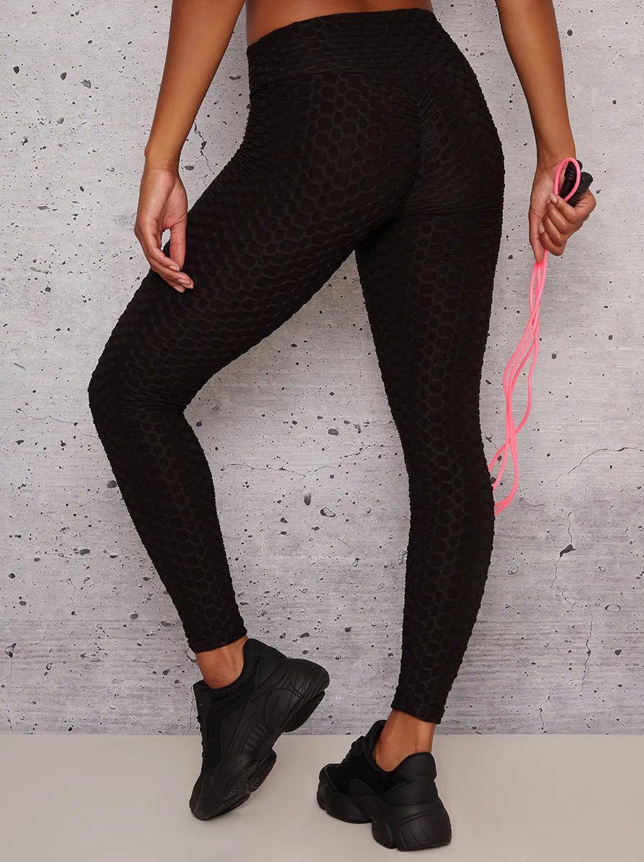 Mid Rise Waffle Detail Gym Leggings in Black sold by Chi Chi London product image thumbnail 4