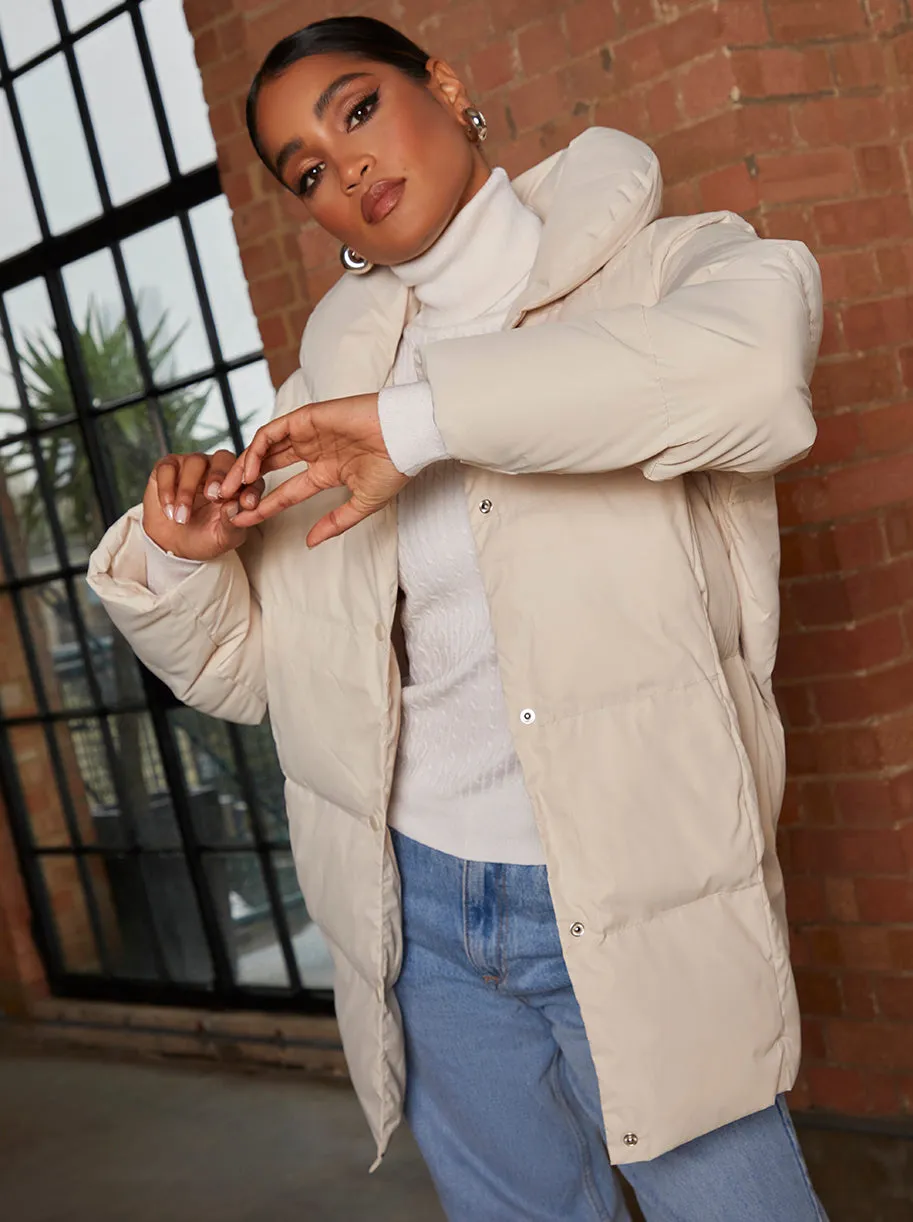 Padded Puffer Coat in Cream sold by Chi Chi London