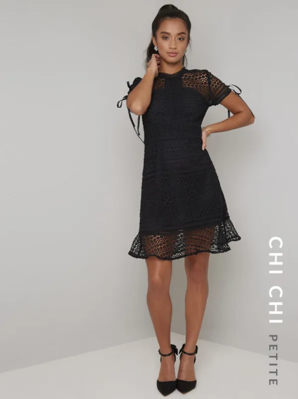 Petite Crochet Tie Detail Frill Hem Dress in Black sold by Chi Chi London