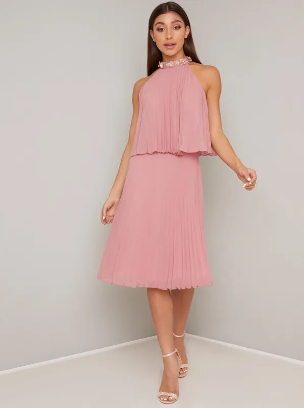 Halterneck Pleat Overlay Midi Dress In Rose Gold sold by Chi Chi London