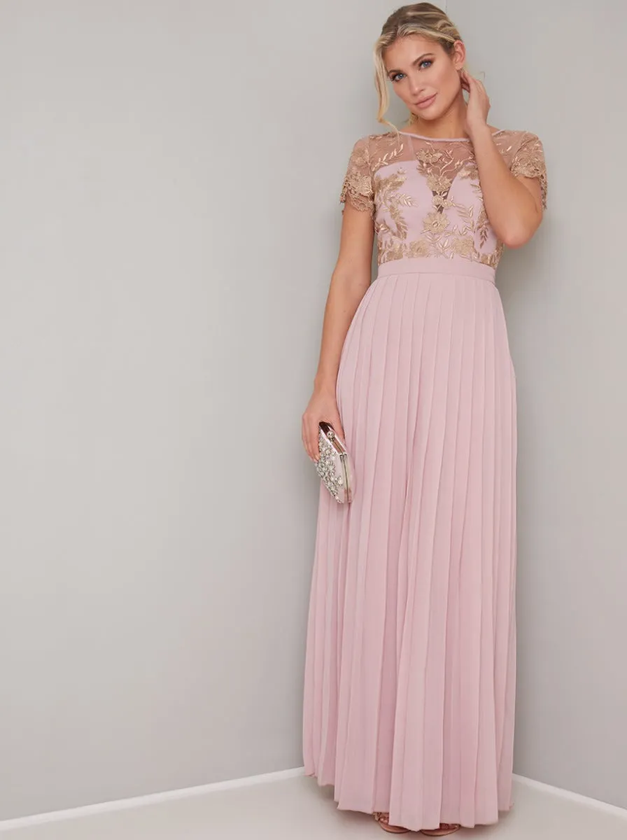 Lace Embroidered Short Sleeved Pleat Maxi Dress in Pink sold by Chi Chi London