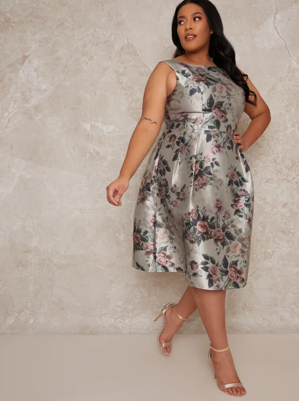 Plus Size Floral Midi Dress in Green sold by Chi Chi London