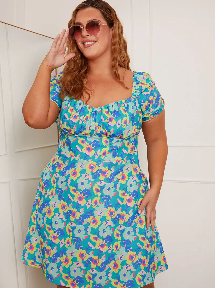 Plus Size Puff Sleeve Floral Mini Dress in Green sold by Chi Chi London
