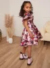 Younger Girls Flutter Sleeve Floral Midi Dress in Pink sold by Chi Chi London