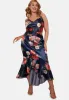 Plus Size Sleeveless Floral Print Ruffle Hem Midi Dress in Navy sold by Chi Chi London
