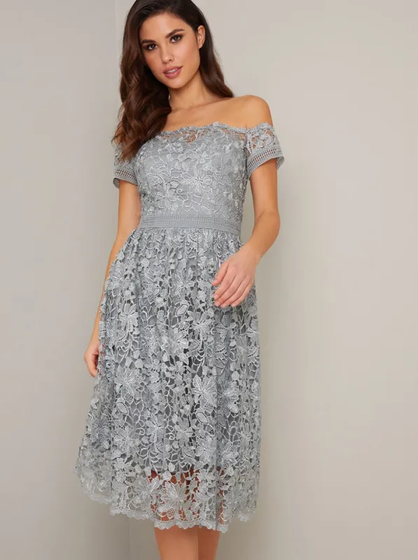 Bardot Neck Lace Crochet Midi Dress in Green sold by Chi Chi London