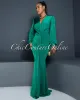 *Martina Green Plunging Neckline Draped Maxi Dress sold by Chic Couture