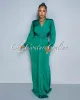 *Martina Green Plunging Neckline Draped Maxi Dress sold by Chic Couture