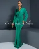 *Martina Green Plunging Neckline Draped Maxi Dress sold by Chic Couture