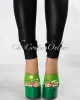 *Inji Green Clear Upper Platform Statement Heels sold by Chic Couture