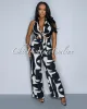 Anise Black Nude Key-Hole Halter Wide Legs Jumpsuit sold by Chic Couture