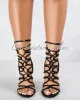 *Uptown Black Faux Suede Lace-Up Heels sold by Chic Couture